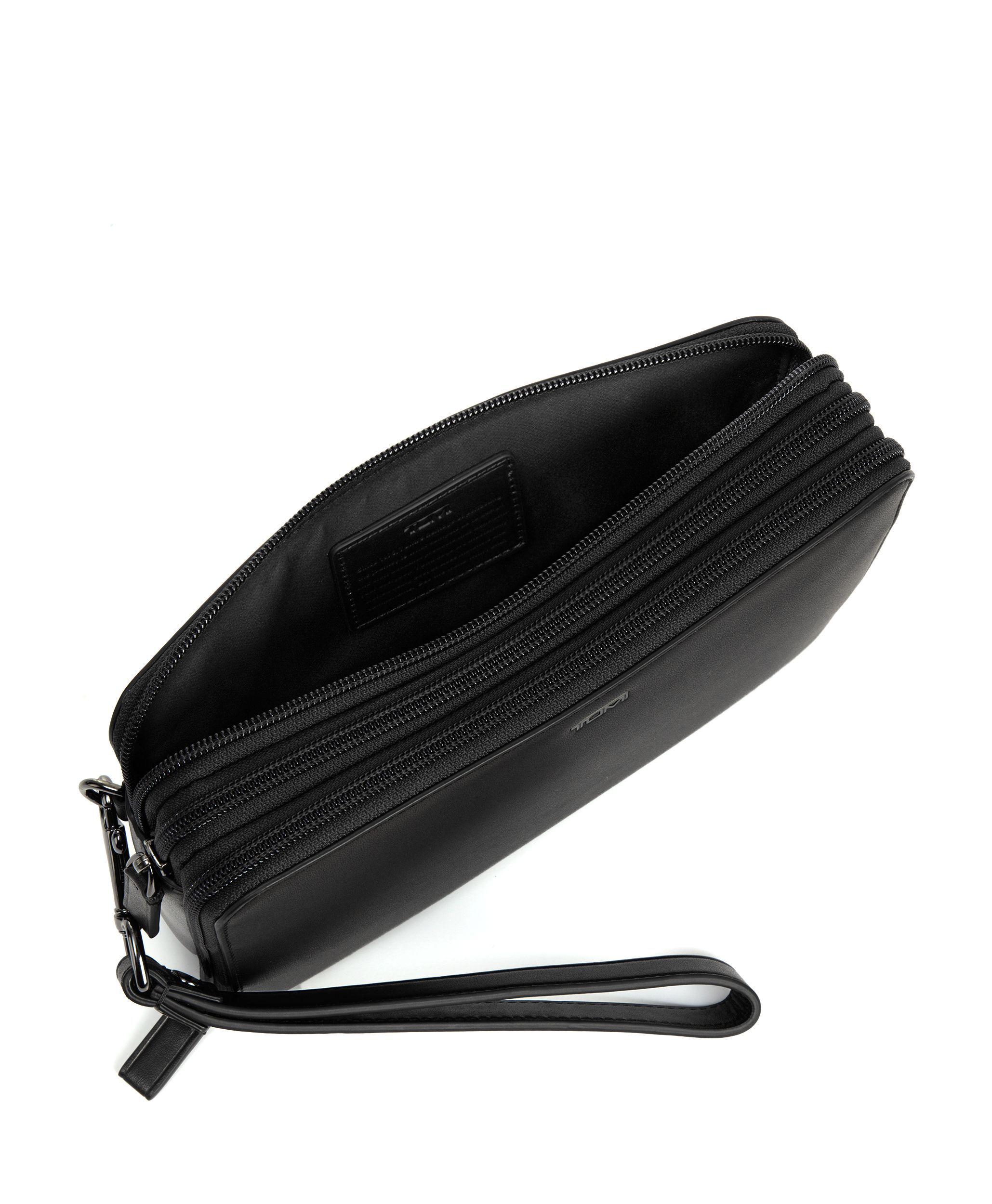 Triple zip clutch tumi 2025