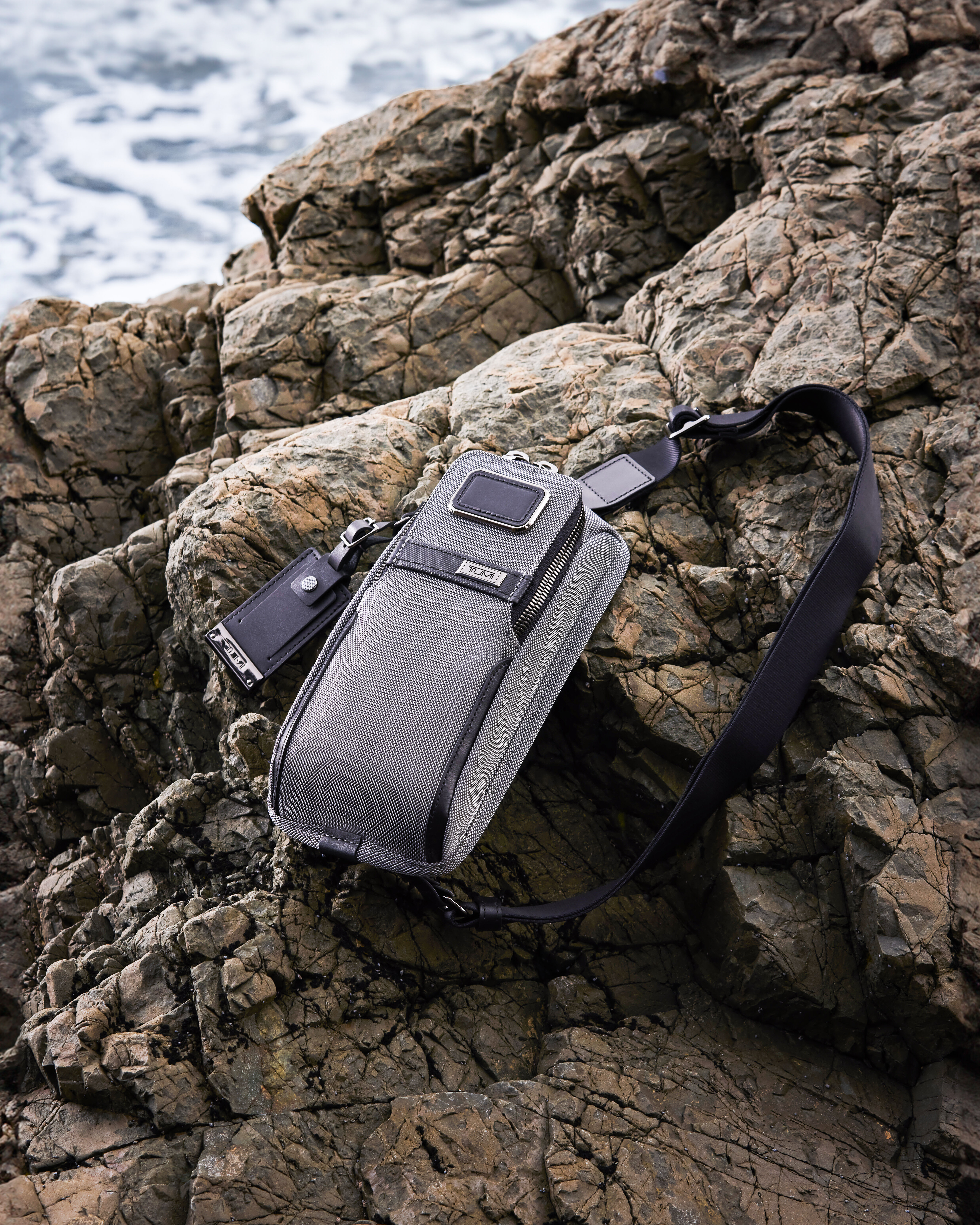 Tumi sling sale